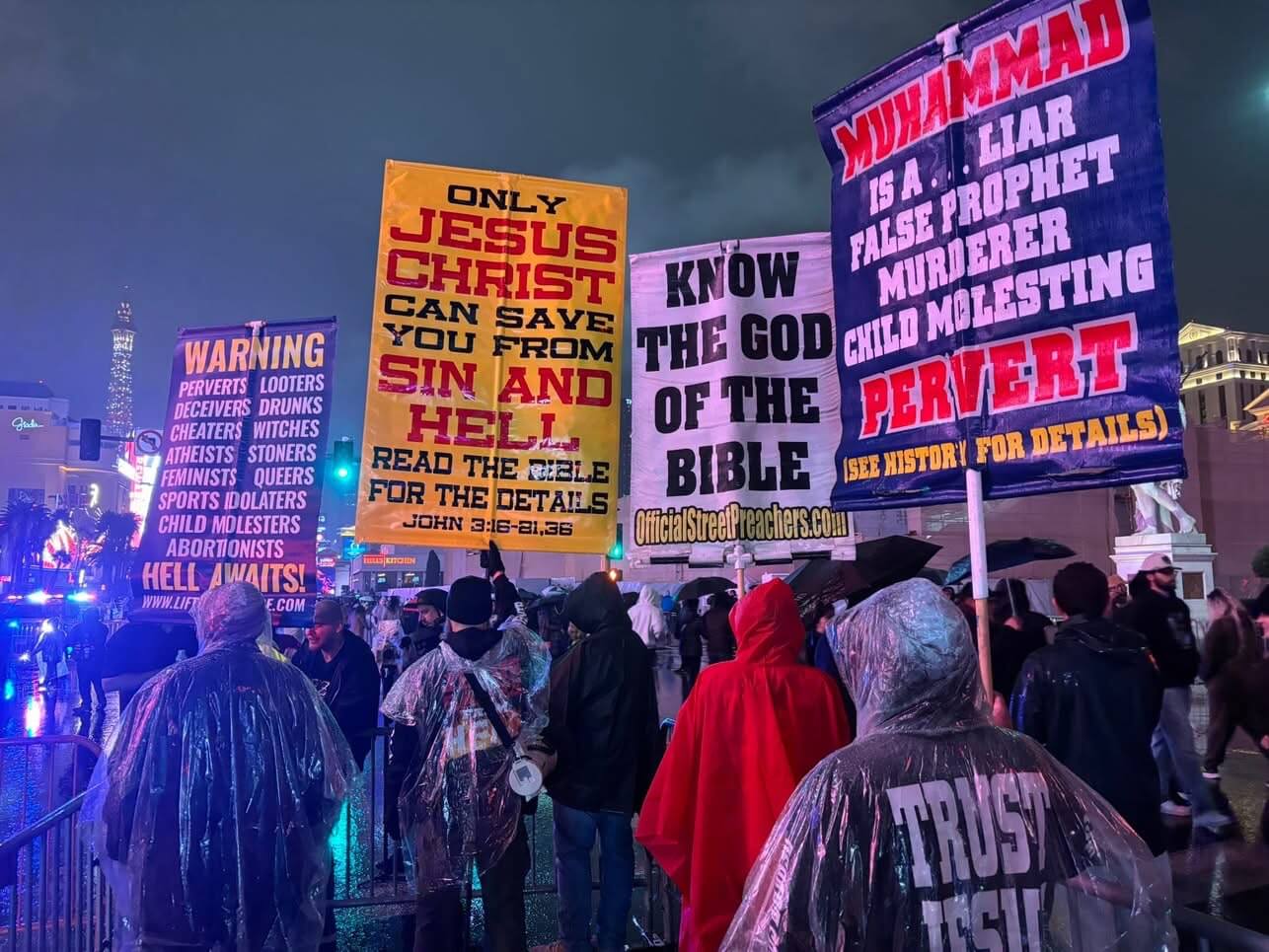 Night street preaching with banners